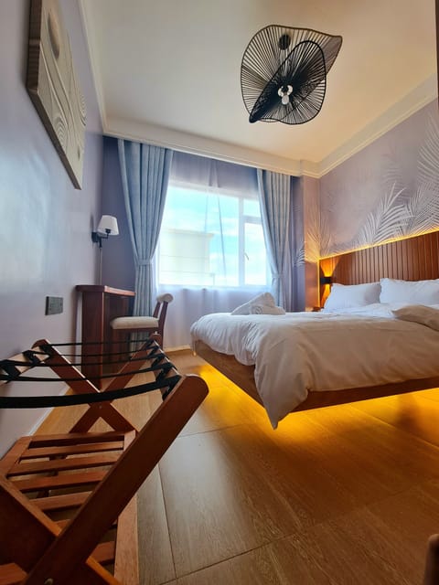 Unwind in a cozy floating bed with warm homey comfort for a truly restful stay