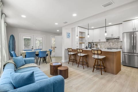 Flow from kitchen to couch to dining table without missing a single laugh. Our open-concept layout keeps everyone connected—and the good times rolling.