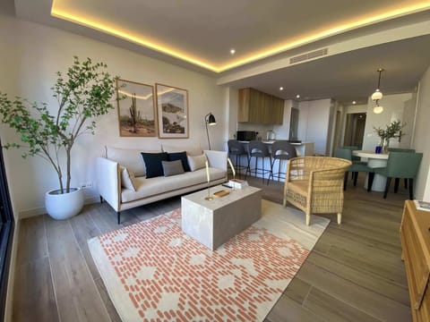 Bright living area with rug.