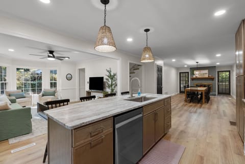 View of the kitchen, sitting room and dining room.  This is all on the main level of the house. 