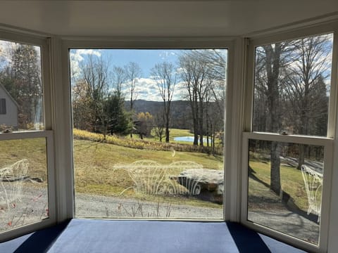 Kitchen sitting area with views of pond