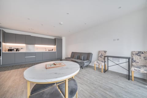 Alternate view of the living area and kitchen