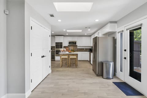 Fully Equipped Kitchen | Modern Appliances, Spacious Counters & Stylish Island Seating