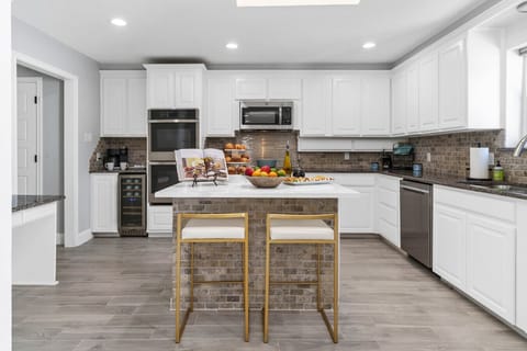 Fully Equipped Kitchen | Modern Appliances, Spacious Counters & Stylish Island Seating