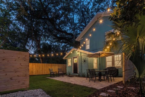 Enjoy a charming, private patio retreat on a lush, tropical greenery.