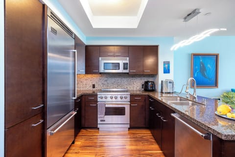 Kitchen - Stainless steel, Wolf appliances including microwave oven, dishwasher, oven and refrigerator.