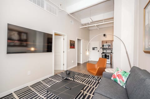 Unwind in the stylish living room & stream your favorites on the smart TV​