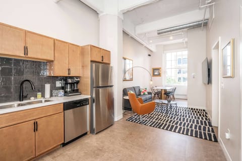 The sleek, open kitchen is well equipped for an unforgettable getaway​