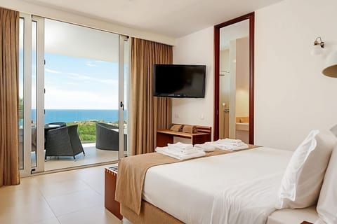 Wake to ocean views from bed, then step onto balcony.