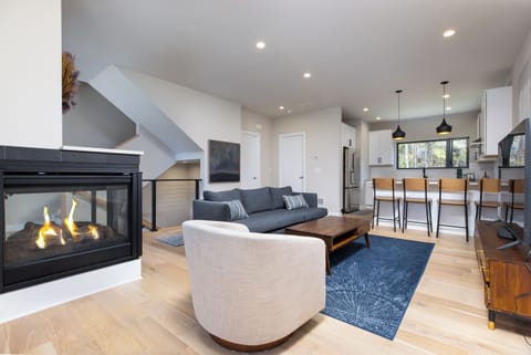 Open Living Area with Propane Fireplace on Second Floor (requires 1 flight of stairs to access)