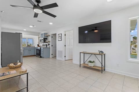 An open space with modern appliances and a stylish design creates a perfect hub for gatherings.