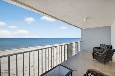 Relax on the oceanfront balcony w/ seating & endless blue water views just steps away.
