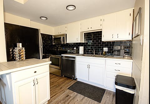 With kitchen appliances and essential cookware, the kitchen makes preparing meals easy and enjoyable.