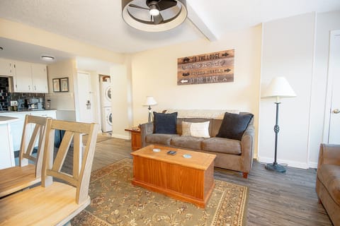 The living room opens onto a balcony, perfect for soaking up fresh mountain air.