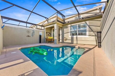 Splash into fun in your private, screened-in pool with a playful float and a shaded lanai for alfresco dining.