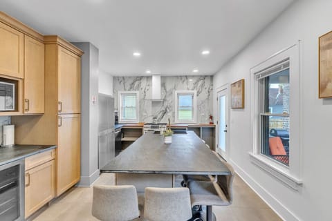 Open dining and kitchen area designed for easy meal preparation