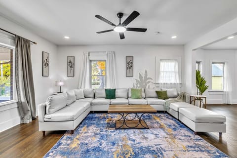 Bright and inviting living area with comfortable seating and natural light