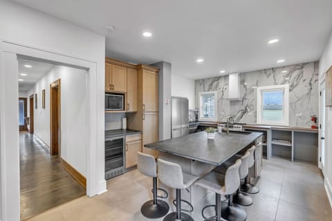 Open dining and kitchen area designed for easy meal preparation