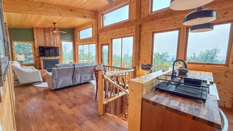 A flight of stairs connects the upper level to the lower level.