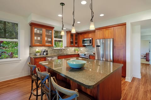 Chef‑ready kitchen with clean lines, modern appliances, and ample counter space for preparing island meals.
