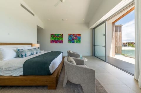 Step onto the terrace and breathe in breezy lagoon views.