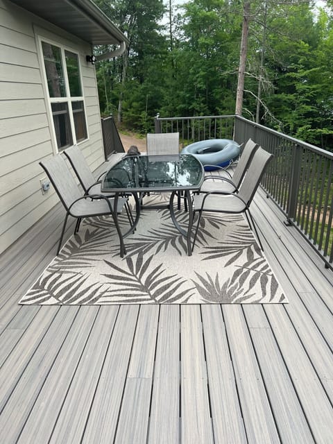 Outdoor dining table - seats 6, there are 10 chairs