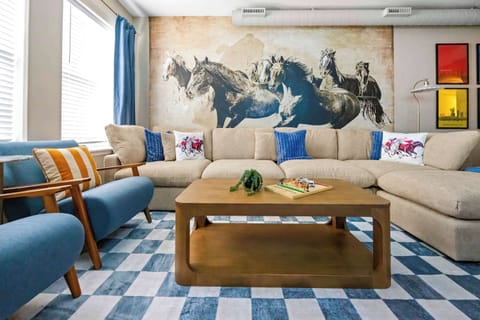 Living Room: Modern Comfort, Timeless Warmth – Thoughtfully designed with plush seating, natural light, and calming tones, this space is the heart of your stay.