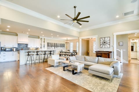 Elegant open floor plan with hardwood floors throughout.