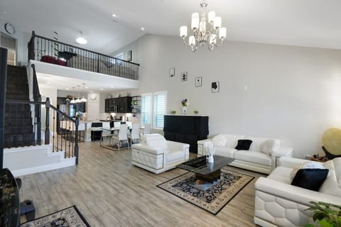 🛋 Living Room “Cathedral ceilings, leather seating, and vibes that feel like vacation.”