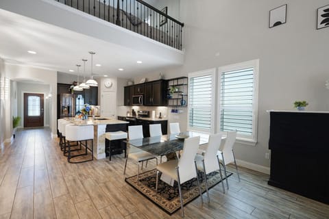 🍳 Kitchen + Dining “Modern, bright, and perfect for group meals that turn into memories.”