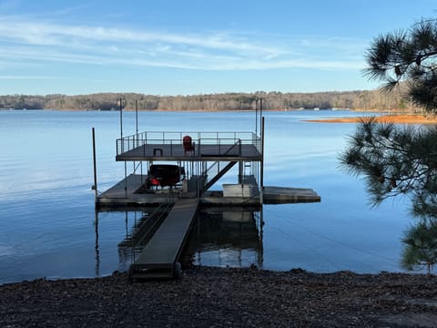 Double-decker dock with sunshade, 2 jet ski ports and small boat slip available.