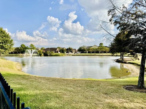 Peaceful lake view just steps from the home — perfect for morning walks or unwinding by the water.