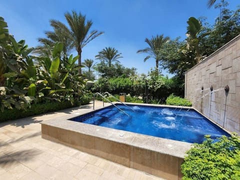 Only a few steps away  a jacuzzi to spoil yourself in cool wind and summer sun! 
