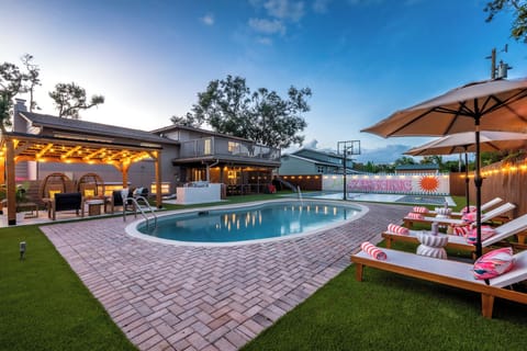 Private resort-style backyard - heated pool, pergola lounge,  & outdoor theater