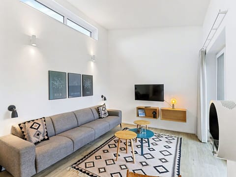 Furniture, Interior Design, Couch, Flooring, Wall, Floor, Living Room, Wood, Ceiling, Room
