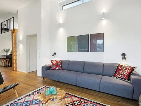 Furniture, Interior Design, Flooring, Wall, Couch, Floor, Wood, Living Room, Ceiling, Room