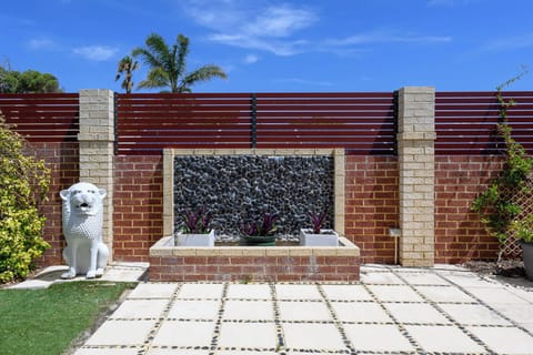 Every detail matters. Enjoy the clean lines of the paved courtyard and the sophisticated design of our custom water fountain. A private, gated space perfect for soaking up the sun and fresh air.