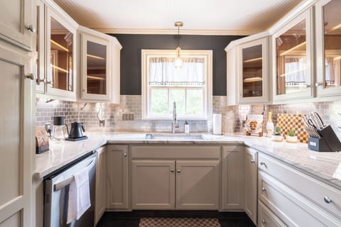 Polished, practical, and perfectly lit — this kitchen boasts luxury touches and thoughtful design at every turn.