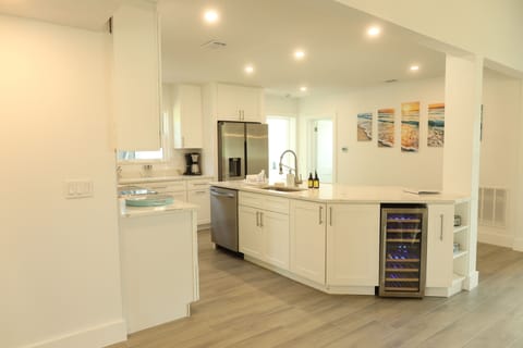 Open Kitchen with built in wine fridge