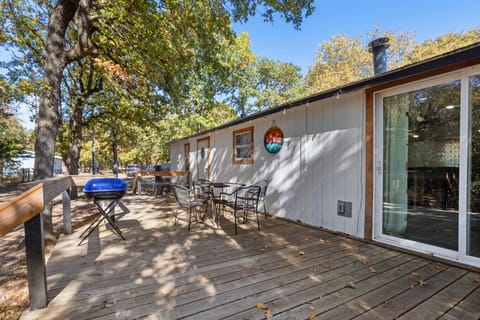 Cozy Cabin Exterior | Spacious Wooden Deck | Outdoor Seating Area & Grill | Surrounded by Nature