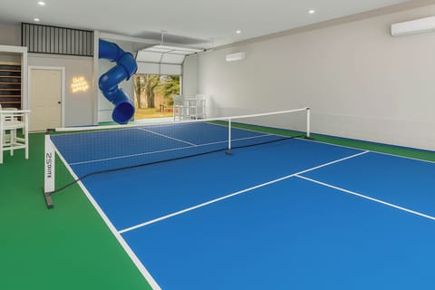 Climate controlled pickleball barn and 9' twisty slide will entertain all ages.