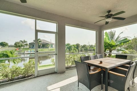 Welcome to your serene getaway! Enjoy stunning canal views from the sunroom, the perfect spot to relax and soak in the beauty of Cape Coral.