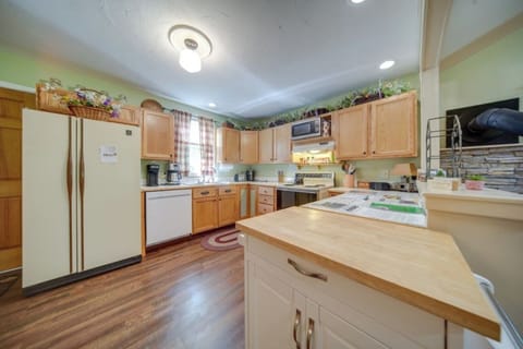 Gather in this inviting kitchen, where cooking and enjoying meals become a part of your cozy getaway.