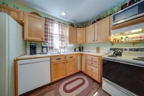 Whip up your favorite meals in this cozy kitchen, designed to make cooking easy and enjoyable.