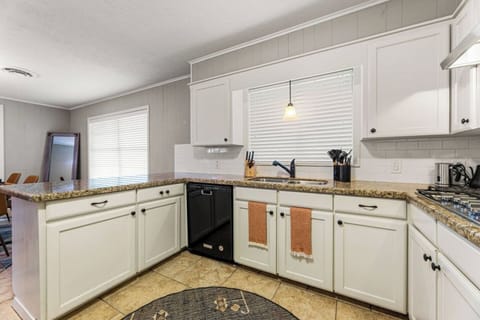 Start the day slowly with coffee at the counter, then come back together here to cook, talk, and unwind.