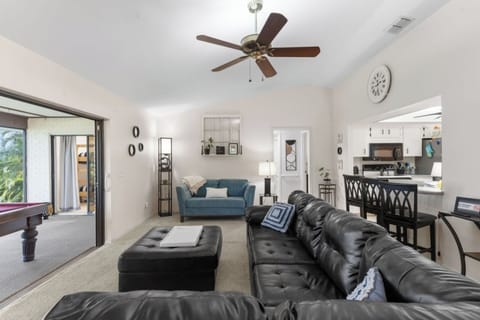 [Living Room] ~ Comfortable sofas, 50” smart TV, Ceiling fan