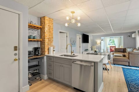 Start your day right in this cozy corner, perfect for making coffee, blending smoothies, or enjoying a quick bite before heading out.