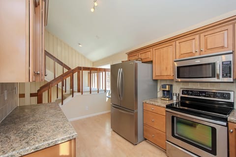 Kitchen and stairs to the upstairs bedroom