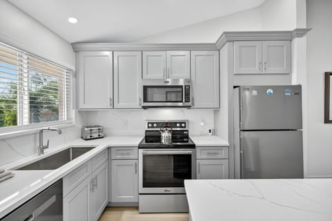 Modern kitchen with stainless steel appliances