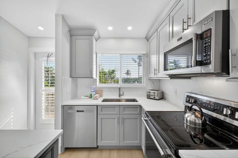 Modern kitchen with stainless steel appliances